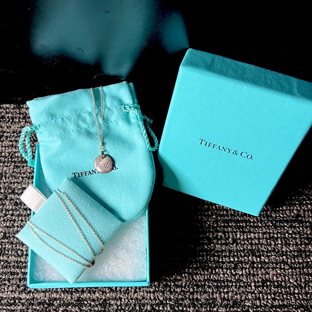 Tiffany & Co. Letter A Notes Alphabet disc charm pendant
